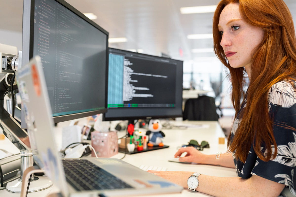 Technology professionals collaborating in a modern office